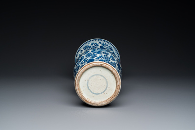 Three Chinese blue and white vases and a monochrome red vase, 19th C.