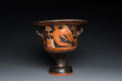 A Greek Apulian red figure bell krater with a winged female and a lady's head, 4th C. b.C.