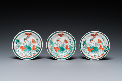 Three Chinese Kangxi-style caf&eacute;-au-lait-ground famille verte cups and saucers, rabbit mark, 19th C.