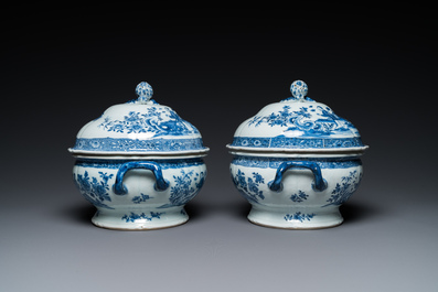 A pair of Chinese blue and white covered tureens with ladies in a garden, Qianlong