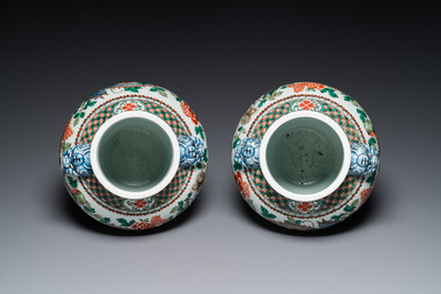 A pair of Chinese famille verte 'dragon' vases, Chenghua mark, 19th C.