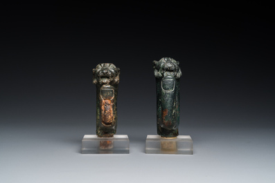 A pair of Roman bronze panther head fittings with finger-shaped hooks, ca. 2nd C.