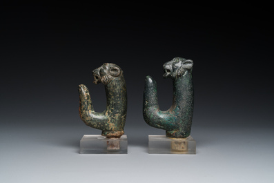 A pair of Roman bronze panther head fittings with finger-shaped hooks, ca. 2nd C.