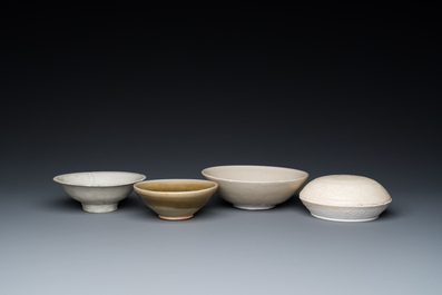 Three Chinese celadon- and qingbai-glazed bowls and a cream-glazed box and cover, Song and later