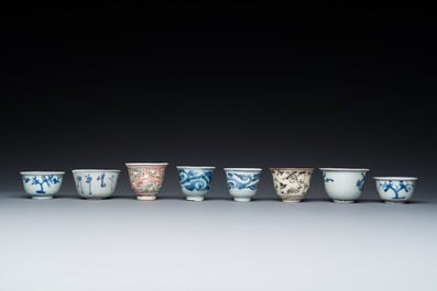 Eight Chinese mostly blue and white wine and tea cups, Ming