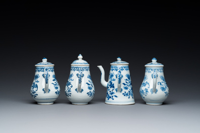 A rare Chinese blue and white set of two jugs and two casters on stand, Qianlong