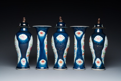 A Chinese blue-ground famille rose garniture of five vases with floral design, Qianlong