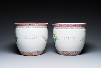 A Chinese famille rose 'hu' vase and a pair of fish bowls, 20th C.