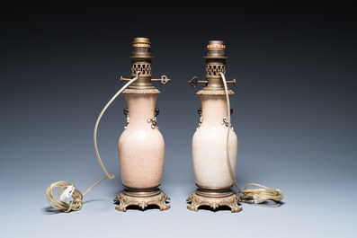 A Chinese blue and white celadon-ground vase, a pair of Nanking vases and a famille verte fish bowl, 19th C.