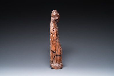 A Flemish carved oak sculpture of Saint Nicolas and the three boys in the salting-tub, 16th C.