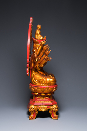 A large Vietnamese red-and-gilt-lacquered wood sculpture of Avalokitesvara with 18 arms, 19/20th C.