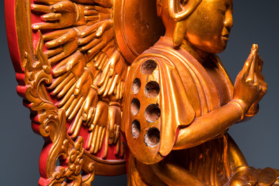 A large Vietnamese red-and-gilt-lacquered wood sculpture of Avalokitesvara with 18 arms, 19/20th C.