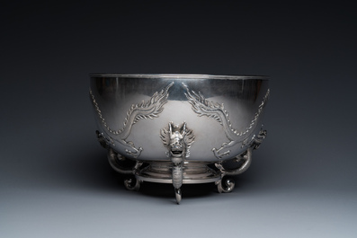 A large Chinese silver bowl resting on three dragon feet, marked for Kun He, Shanghai, 19/20th C.