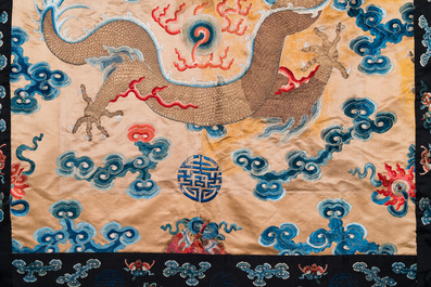 A large Chinese gold-thread-embroidered silk panel with an imperial dragon, 19th C.