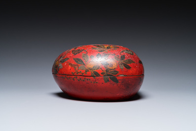 A Chinese peach-shaped painted lacquer box and cover, Qing