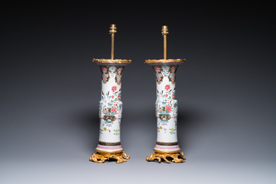 A pair of Chinese famille rose vases with fine gilt bronze lamp mounts, Yongzheng