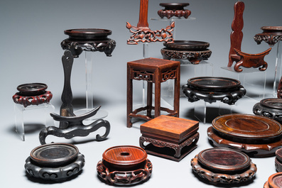 A collection of 25 fine Chinese wooden stands, 19/20th C.