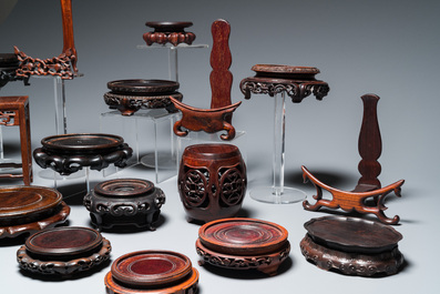 A collection of 25 fine Chinese wooden stands, 19/20th C.