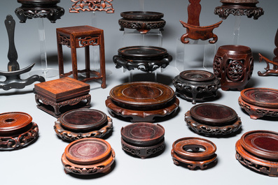 A collection of 25 fine Chinese wooden stands, 19/20th C.