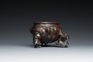 A Chinese lacquered bronze 'foreigners' censer, Ming