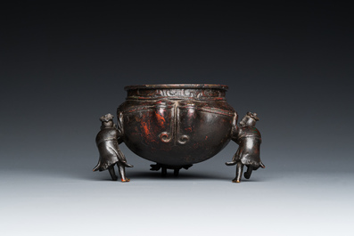 A Chinese lacquered bronze 'foreigners' censer, Ming