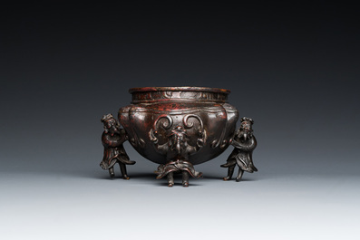 A Chinese lacquered bronze 'foreigners' censer, Ming