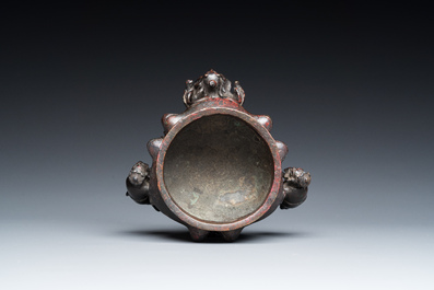 A Chinese lacquered bronze 'foreigners' censer, Ming