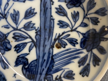 A Chinese blue and white saucer with a pheasant behind a rock, 'rabbit' mark, Wanli