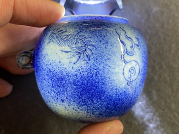 A Chinese powder-blue-glazed bird feeder with a dragon, 19th C.