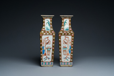 A pair of rectangular Chinese famille rose relief-molded vases, 19th C.