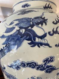 A large Chinese blue and white 'dragons' vase and cover, 19th C.