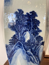 A pair of Chinese blue and white hexagonal 'mountainous landscape' vases, 19th C.