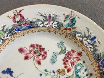 Assiette en porcelaine de Chine famille rose &agrave; d&eacute;cor de canards et d'immortels, Yongzheng