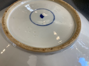 Two Chinese blue and white 'mountainous landscape' dishes, 19th C.