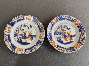 A pair of Chinese Imari-style 'lady with two boys' plates, Kangxi