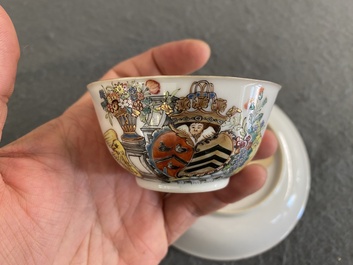 A Chinese Dutch market famille rose cup and saucer with the arms of van Isselmuden and van Haersolte, Qianlong