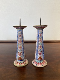 A pair of Chinese Canton enamel candlesticks, Yongzheng/Qianlong