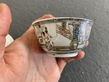 A fine Chinese famille rose cup and saucer with go-players, Yongzheng