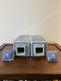 A pair of Chinese blue and white square 'narrative subject' vases and covers, Kangxi