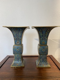 A pair of Chinese cloisonn&eacute; 'gu' vases, Kangxi