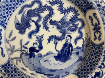 A Chinese blue and white 'two phoenixes and an immortal' plate, Kangxi/Yongzheng