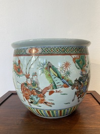 A Chinese famille verte fish bowl with warriors on horseback, 19th C.