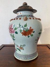 A Chinese famille rose vase with wooden cover, 19th C.