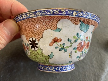 A Chinese Canton enamel covered bowl with flowers and butterflies, Yongzheng/Qianlong