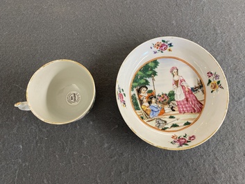 A Chinese famille rose 'European subject' cup and saucer, Qianlong