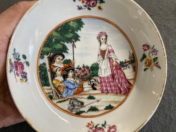 A Chinese famille rose 'European subject' cup and saucer, Qianlong