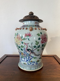 A Chinese famille rose vase with wooden cover, 19th C.