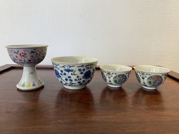 A Chinese famille rose stem cup, a blue and white bowl and a pair of doucai bowls, Yongzheng and later