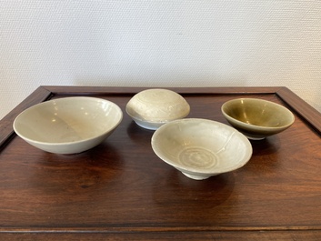 Three Chinese celadon- and qingbai-glazed bowls and a cream-glazed box and cover, Song and later