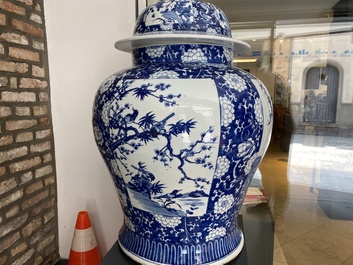 An exceptionally large pair of Chinese blue and white vases and covers, 19/20th C.